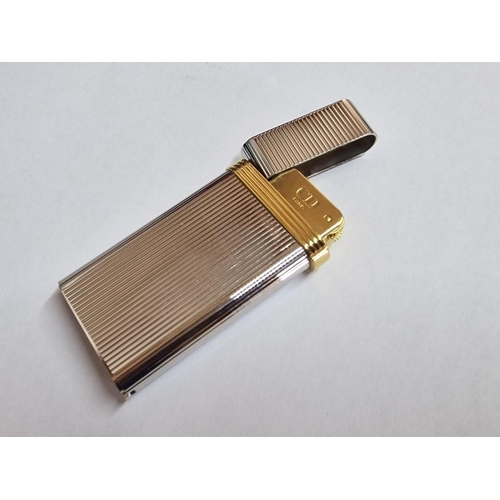 134 - Christian Dior (Paris) Stainless Steel Gas Lighter with Gold Tone Band, Swiss Made