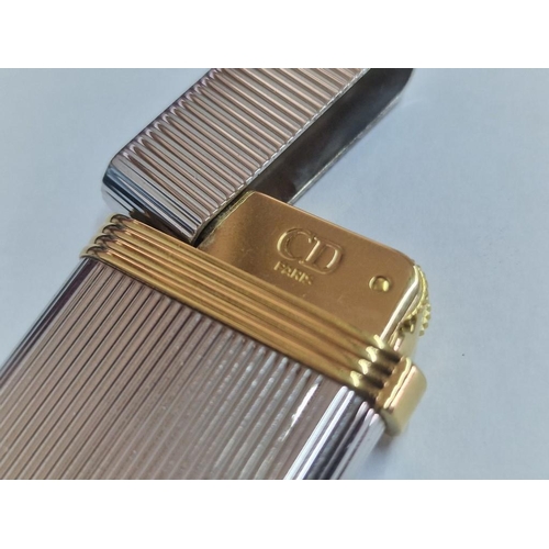 134 - Christian Dior (Paris) Stainless Steel Gas Lighter with Gold Tone Band, Swiss Made