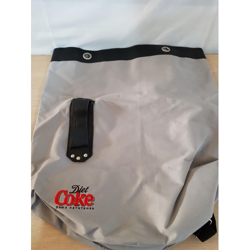 91 - Coca Cola Memorabilia; 2 x Large Bags in Style of Sack and Backpack (3pcs)