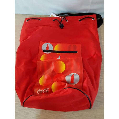 91 - Coca Cola Memorabilia; 2 x Large Bags in Style of Sack and Backpack (3pcs)