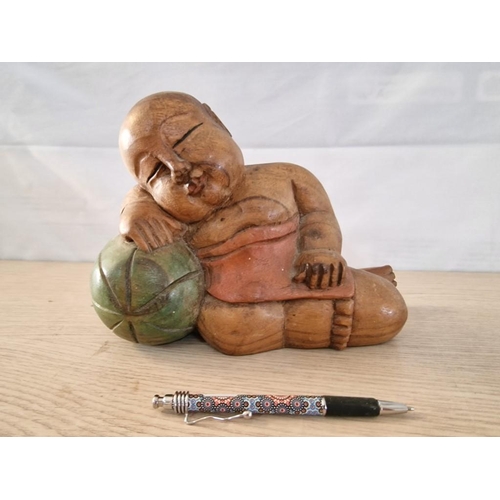 28 - Wooden Baby Buddha Resting on a Watermelon, (Approx. 25 x 18cm Overall)