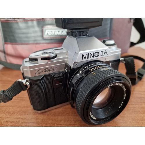 735 - Minolta X-300 Camera with Minolta MD 50mm Lens and External Flash Unit, Together with Camera Bag, (U... 