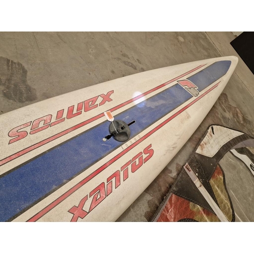 417 - Windsurfing Set; Xantos 295 Board, Gaastra Sail, Boom, and Bag with Fins, Accessories, etc