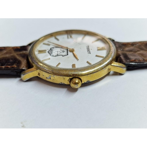 572 - Tissot Wrist Watch with Gold Tone Case, White Face and Roman Numeral Hour Markers, Quartz, (C275K), ... 