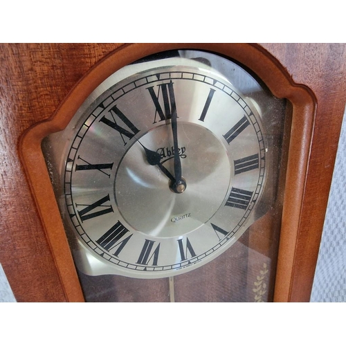 249 - 'Abbey' Wall Clock in Wooden Case with Pendulum, Quartz, Untested