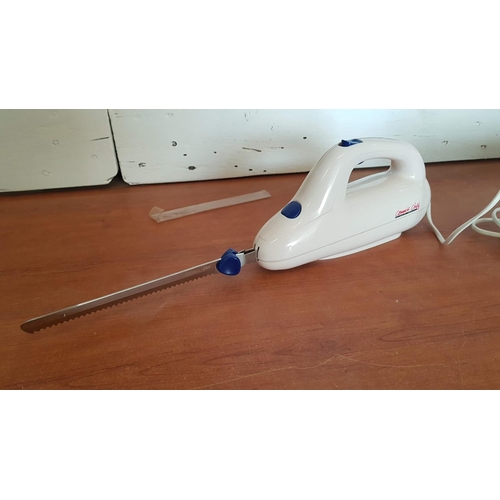 228 - Small Steam Iron (DB 1750 C3) Together with 