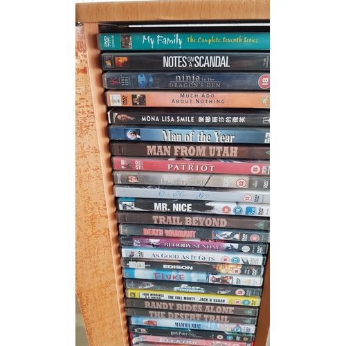 229 - Teak Coloured DVD Stand with 42 x Assorted Movies on DVD's (Stand 23 x 17 x 85cm)