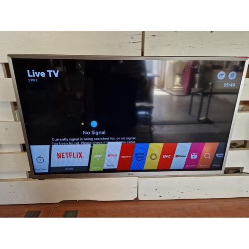 105 - LG 32'' Smart TV, (Model: 32LJ590U), with Remote Control and Wall Bracket, * Tested & Working *