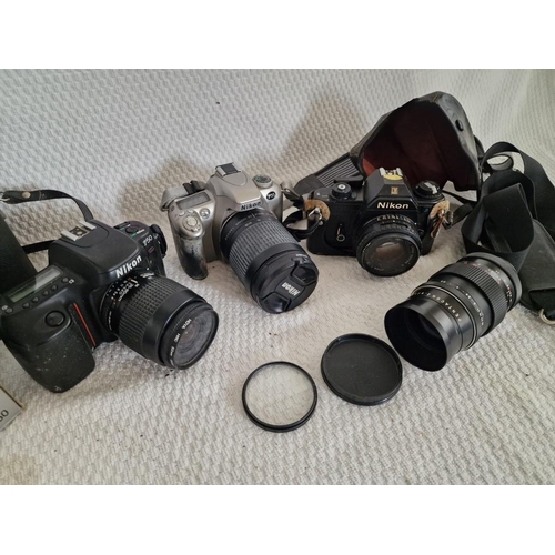 130 - Collection of 3 x Nikon Cameras; F50, F55 and EM, Together with Lenses, Flash Unit, Camera Bag, etc ... 