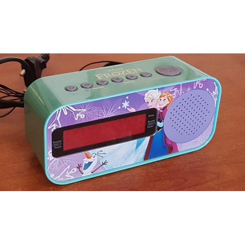 64 - 'Frozen' Alarm Clock Radio, Working When Lotted