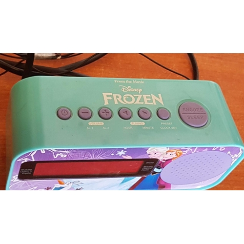 64 - 'Frozen' Alarm Clock Radio, Working When Lotted