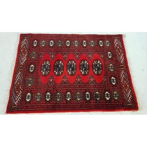 162 - Reddish Small Persian Style Wool Carpet with Traditional Pattern, (Approx. 64 x 90cm)