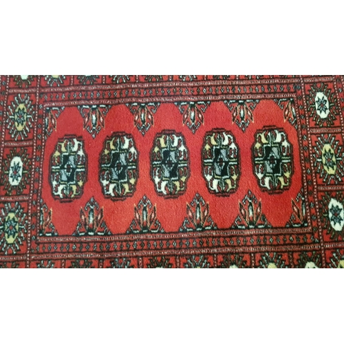 162 - Reddish Small Persian Style Wool Carpet with Traditional Pattern, (Approx. 64 x 90cm)