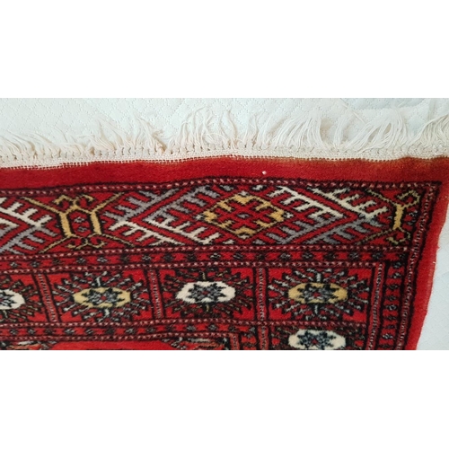 162 - Reddish Small Persian Style Wool Carpet with Traditional Pattern, (Approx. 64 x 90cm)