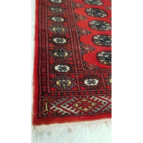 162 - Reddish Small Persian Style Wool Carpet with Traditional Pattern, (Approx. 64 x 90cm)