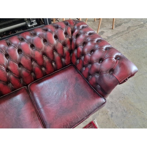 76 - 2 Seater Chesterfield Sofa, Red Oxblood Leather with Button Back, Studded Scroll Arms and Back Rest