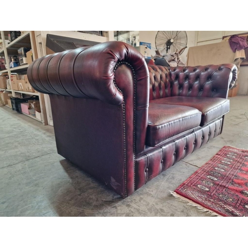 76 - 2 Seater Chesterfield Sofa, Red Oxblood Leather with Button Back, Studded Scroll Arms and Back Rest