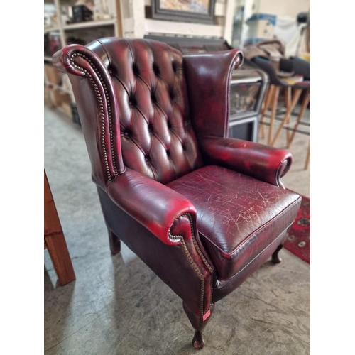 77 - Queen Anne Chesterfield Wing Back Armchair, Red Oxblood Leather, Studded Button Back, (some signs of... 