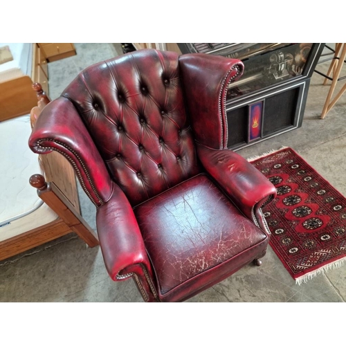 77 - Queen Anne Chesterfield Wing Back Armchair, Red Oxblood Leather, Studded Button Back, (some signs of... 