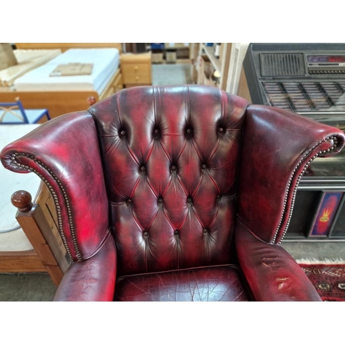 77 - Queen Anne Chesterfield Wing Back Armchair, Red Oxblood Leather, Studded Button Back, (some signs of... 