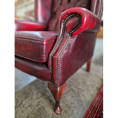 77 - Queen Anne Chesterfield Wing Back Armchair, Red Oxblood Leather, Studded Button Back, (some signs of... 