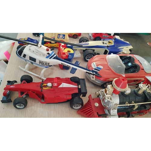 59 - Collection of Assorted Toy Cars, Helicopter, Racing Cars, Airplane, Train, etc