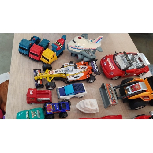 59 - Collection of Assorted Toy Cars, Helicopter, Racing Cars, Airplane, Train, etc