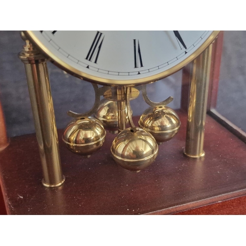 107 - Anniversary / Mantle Clock, 'The Greenwich Clock Co, London', Walnut Effect 4-Glass Case with Brass ... 