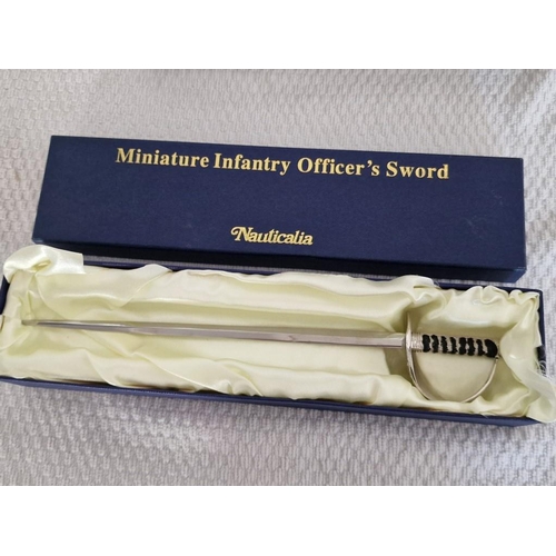 115 - 2 x Miniature Replica Swords; Wilkinson Sword 'The Mortuary Sword' and Nauticalia 'Infantry Officers... 