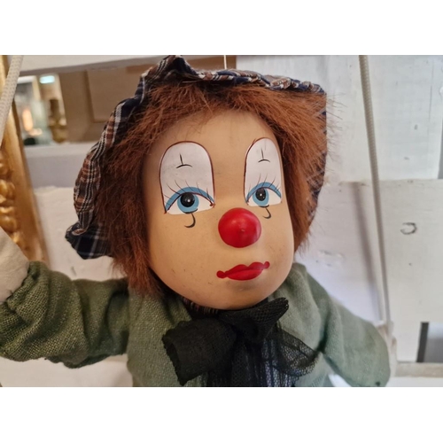 714 - Hanging Clown Figurine on Swinging Rope Seat with Painted Face