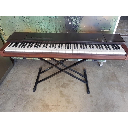 100A - Yamaha PF15 Digital Piano / Electric Keyboard, on Stand * Basic Test and Working *

(Donation by Mrs... 