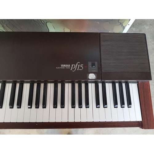 100A - Yamaha PF15 Digital Piano / Electric Keyboard, on Stand * Basic Test and Working *

(Donation by Mrs... 