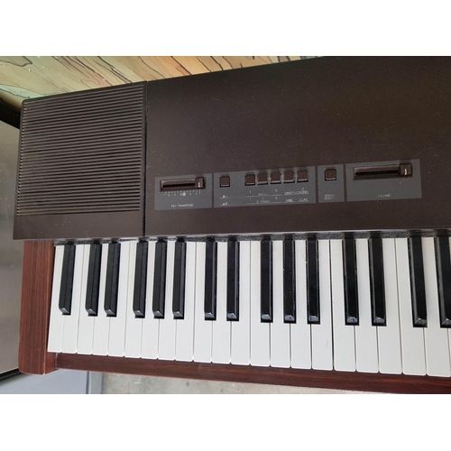 100A - Yamaha PF15 Digital Piano / Electric Keyboard, on Stand * Basic Test and Working *

(Donation by Mrs... 