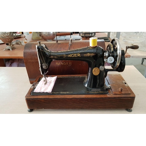 20 - Antique Cast Iron Singer Sewing Machine, Circa 1922, Hand Cranked, in Wooden Case with Numerous Atta... 