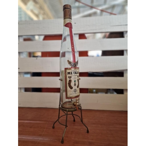 126 - Vintage / Early 3Ltr Bottle of Metaxa (Empty) with Pouring Spout, on Metal Stand, (Approx. H: 70cm)