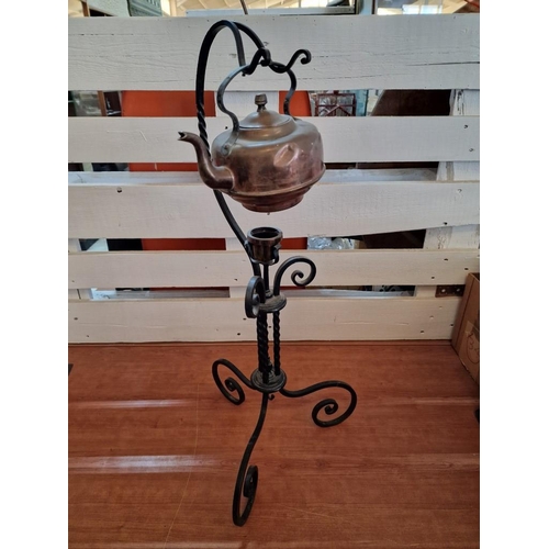 129 - Vintage Copper Kettle on Decorative Floor Standing Black Metal Warming Stand, (Approx. H: 76cm)