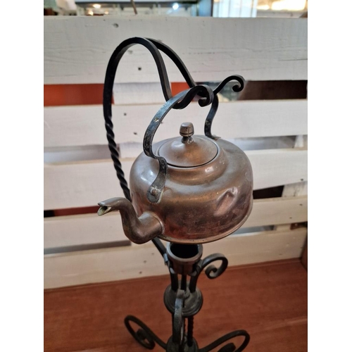 129 - Vintage Copper Kettle on Decorative Floor Standing Black Metal Warming Stand, (Approx. H: 76cm)