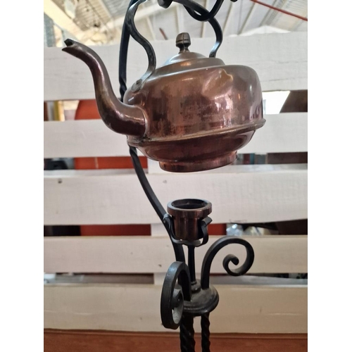 129 - Vintage Copper Kettle on Decorative Floor Standing Black Metal Warming Stand, (Approx. H: 76cm)