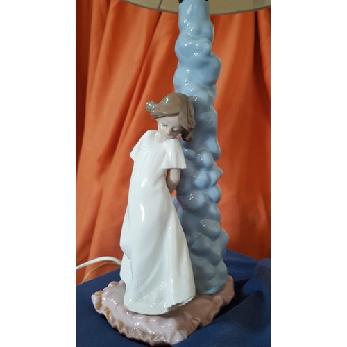 15 - Nao Porcelain Table Lamp with Shade, Featuring 'Girl on her way to bed', (Approx. 40 x 14cm Overall)... 