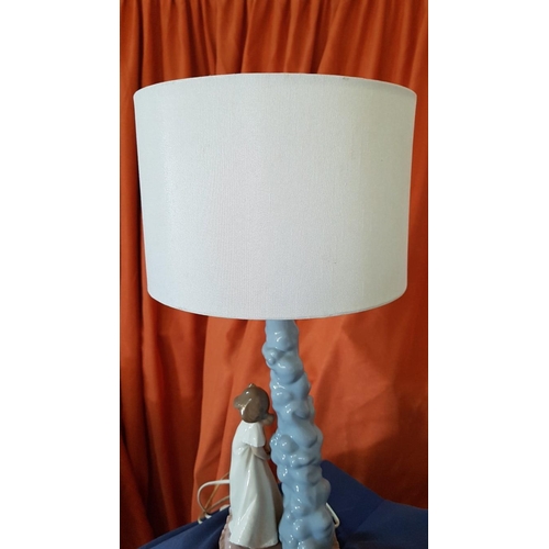 15 - Nao Porcelain Table Lamp with Shade, Featuring 'Girl on her way to bed', (Approx. 40 x 14cm Overall)... 