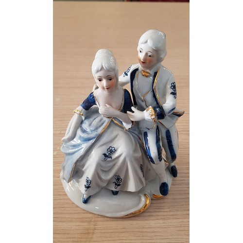 56 - 4 x Porcelain Ornaments; 2 x Victorian Style Girls with Posies (10cm), Plus Regency 'Couple of Settl... 