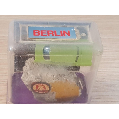 30A - Berlin Souvenir / Memento of 9 November 1989; Piece of the Berlin Wall with Model Car, Coin, Coat of... 