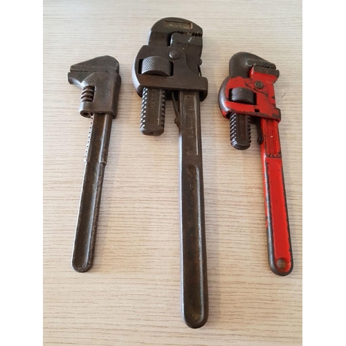 66 - Two Stilsons; 1 x 10'' and 1 x 14'' and an American Wrench