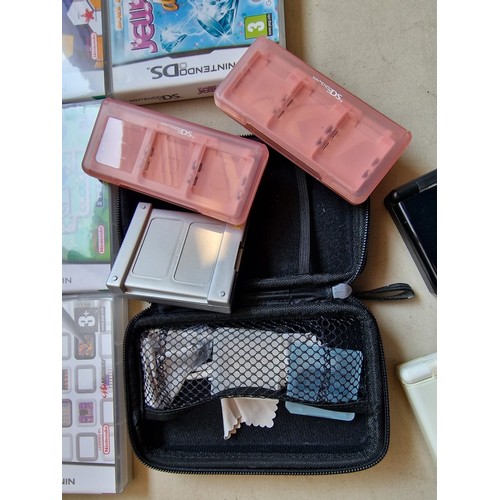 153 - 2 x Nintendo DS Lite (Model: USG-001), White & Black Colours, Together with 18 x Games and Carry Cas... 