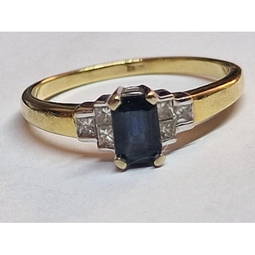 136 - 18ct Gold, Sapphire and Diamond Ring; Rectangular Cut Sapphire in White Gold Setting Offset by 6 x P... 