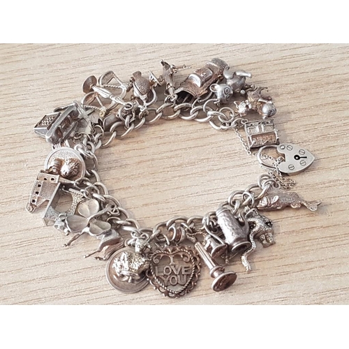 196 - Sterling Silver Charm Bracelet, English Hallmarks with Approx. 25 x Charms, (Total Weight Approx. 92... 