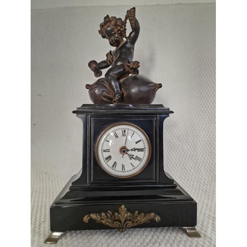 138 - 'Imperio' (Italy) Figural Mantel Clock; Black Slate Effect with Bronze Effect Child / Cherub on Pill... 