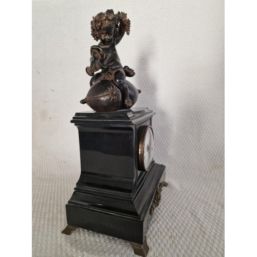 138 - 'Imperio' (Italy) Figural Mantel Clock; Black Slate Effect with Bronze Effect Child / Cherub on Pill... 