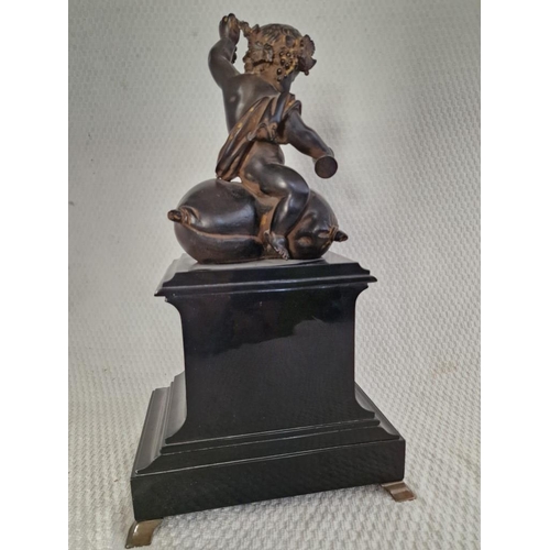 138 - 'Imperio' (Italy) Figural Mantel Clock; Black Slate Effect with Bronze Effect Child / Cherub on Pill... 