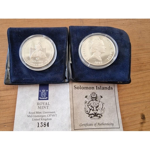 185 - 2 x Sterling Silver Proof Coins; 1992 $10 Soloman Islands, Queen Elizabeth II, in Plastic Capsules a... 